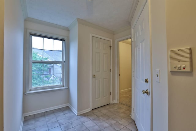 328 Deepwoods Dr, Highland Heights, KY 41076 - unfurnished bedroom featuring ornamental molding, multiple windows, baseboards, and light tile patterned floors