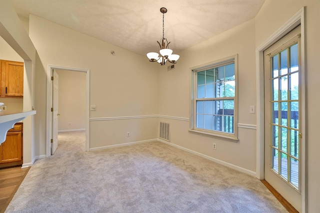 328 Deepwoods Dr, Highland Heights, KY 41076 - unfurnished dining area with a chandelier, light colored carpet, and baseboards