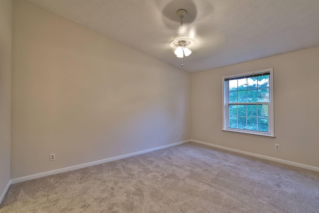 328 Deepwoods Dr, Highland Heights, KY 41076 - spare room featuring baseboards, carpet, a ceiling fan, and vaulted ceiling