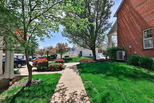 328 Deepwoods Dr, Highland Heights, KY 41076 - view of green lawn with central air condition unit