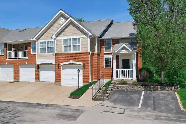 328 Deepwoods Dr, Highland Heights, KY 41076 - multi unit property featuring driveway, brick siding, and a garage