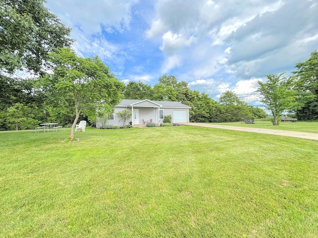 15295 Parkers Grove Rd, Morning View, KY 41063 - view of front of house featuring driveway, a garage, a front lawn, and view of scattered trees