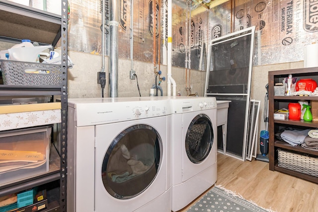 315 Shadow Ridge Dr, Highland Heights, KY 41076 - washroom with washing machine and dryer and wood finished floors