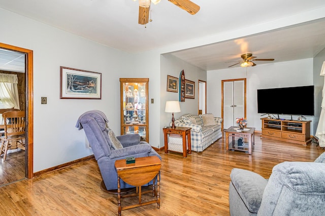 2196 Stevens Branch Rd, Alexandria, KY 41001 - living room featuring a ceiling fan, light wood-style flooring, and baseboards