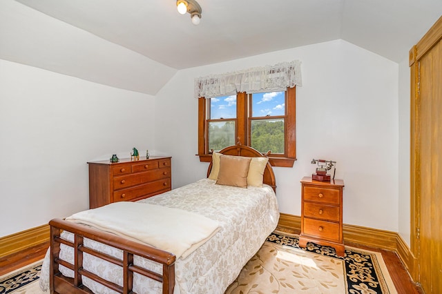 2196 Stevens Branch Rd, Alexandria, KY 41001 - bedroom featuring vaulted ceiling, wood finished floors, and baseboards