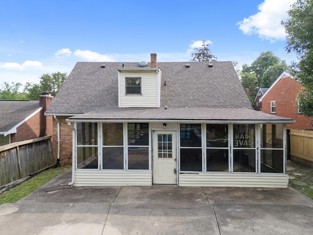 420 Locust St, Erlanger, KY 41018 - back of property with a sunroom, a patio, and roof with shingles