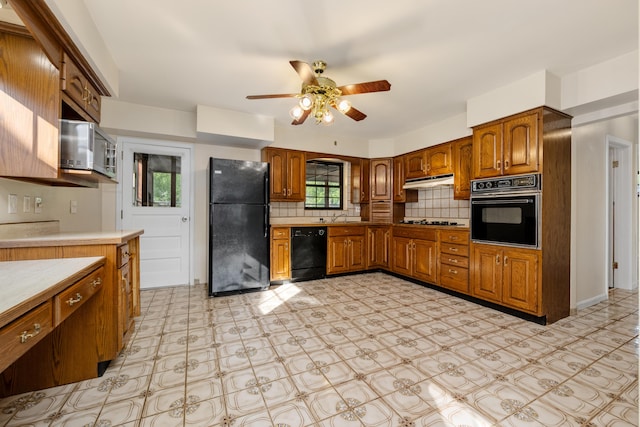 420 Locust St, Erlanger, KY 41018 - kitchen featuring black appliances, a ceiling fan, backsplash, and brown cabinets