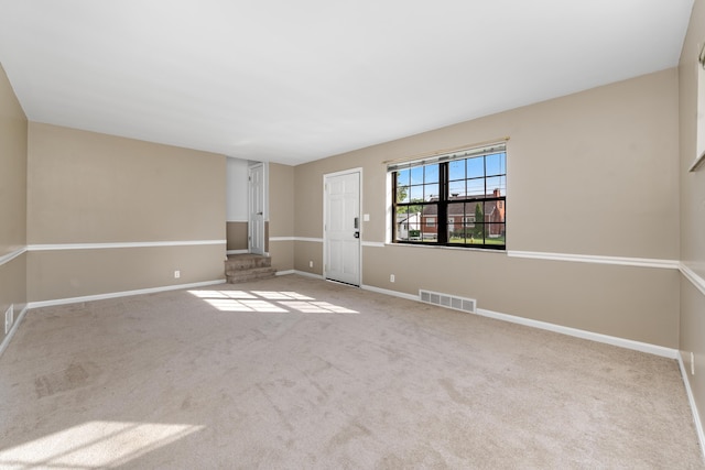420 Locust St, Erlanger, KY 41018 - unfurnished living room featuring carpet and baseboards
