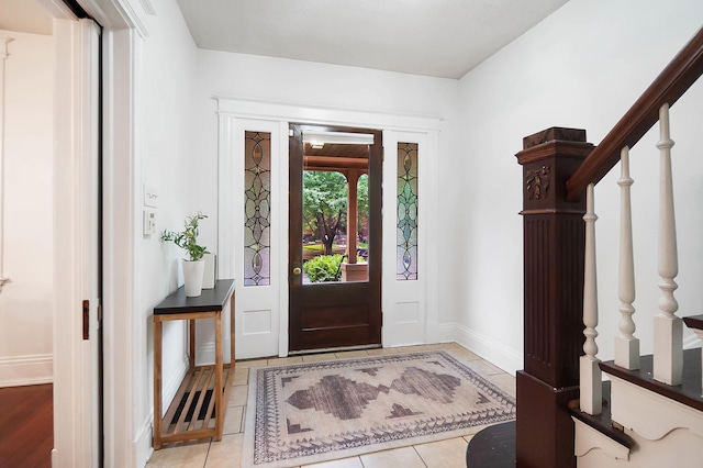 645 Maple Ave, Newport, KY 41071 - tiled entrance foyer featuring baseboards and stairs