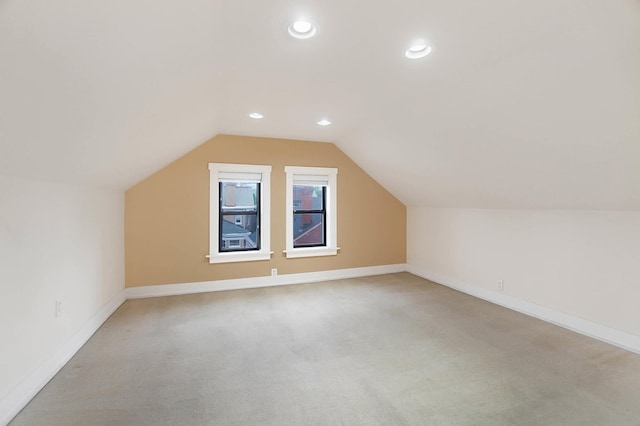 645 Maple Ave, Newport, KY 41071 - additional living space with light carpet, baseboards, lofted ceiling, and recessed lighting