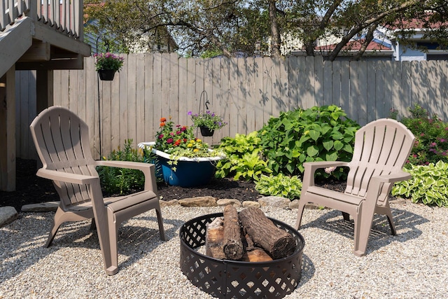 411 Elm St, Ludlow, KY 41016 - view of patio featuring an outdoor fire pit