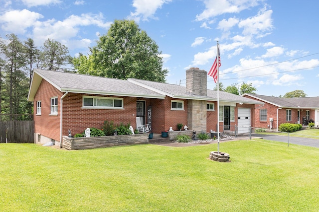 304 Humes Ridge Rd, Williamstown, KY 41097 - single story home featuring an attached garage, asphalt driveway, a chimney, and brick siding