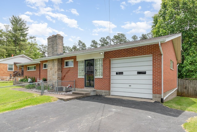 304 Humes Ridge Rd, Williamstown, KY 41097 - ranch-style house with an attached garage, brick siding, a chimney, and asphalt driveway