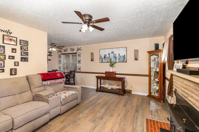 304 Humes Ridge Rd, Williamstown, KY 41097 - living room with ceiling fan, wood-type flooring, a textured ceiling, and baseboards