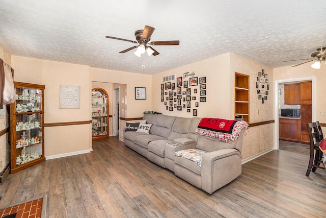 304 Humes Ridge Rd, Williamstown, KY 41097 - living room featuring a ceiling fan, wood finished floors, a textured ceiling, and baseboards
