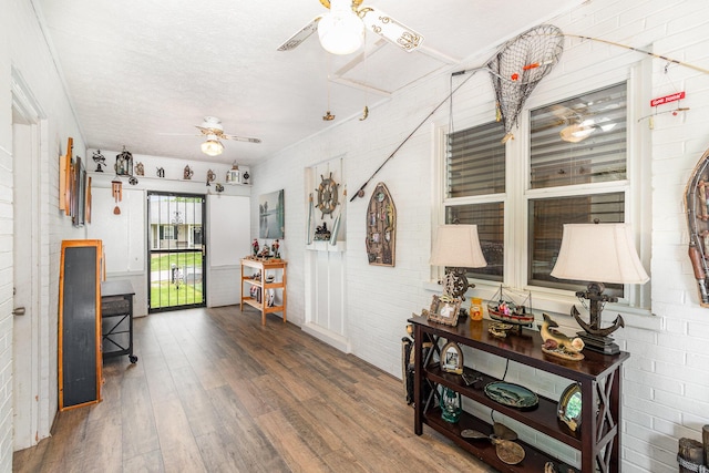 304 Humes Ridge Rd, Williamstown, KY 41097 - sitting room featuring a ceiling fan, wood finished floors, brick wall, and a textured ceiling