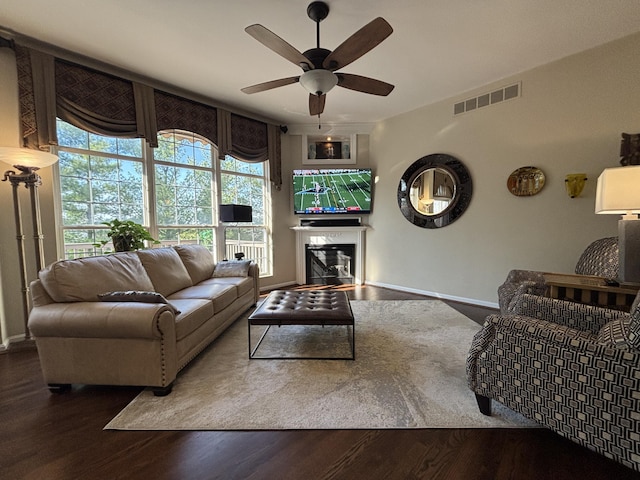 1940 Marktwain Way, Villa Hills, KY 41017 - living area featuring ceiling fan, wood finished floors, baseboards, and a glass covered fireplace