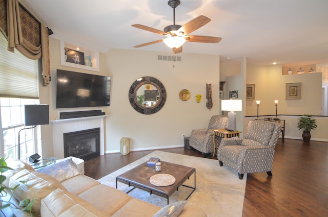 1940 Marktwain Way, Villa Hills, KY 41017 - living room with wood finished floors, a glass covered fireplace, a ceiling fan, and baseboards