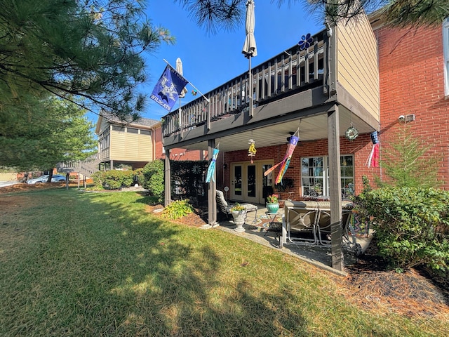 1940 Marktwain Way, Villa Hills, KY 41017 - back of property featuring french doors, a yard, brick siding, and a wooden deck