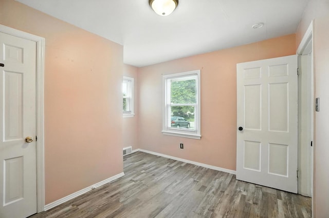 3314 Elizabeth St, Erlanger, KY 41018 - unfurnished bedroom with wood finished floors and baseboards