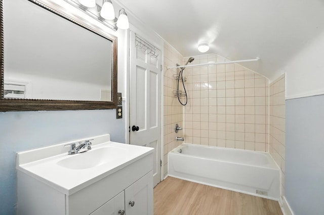 3314 Elizabeth St, Erlanger, KY 41018 - full bathroom with wood finished floors, vanity, and bathtub / shower combination