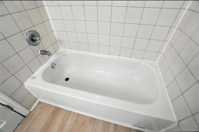 3314 Elizabeth St, Erlanger, KY 41018 - bathroom featuring wood finished floors and shower / washtub combination