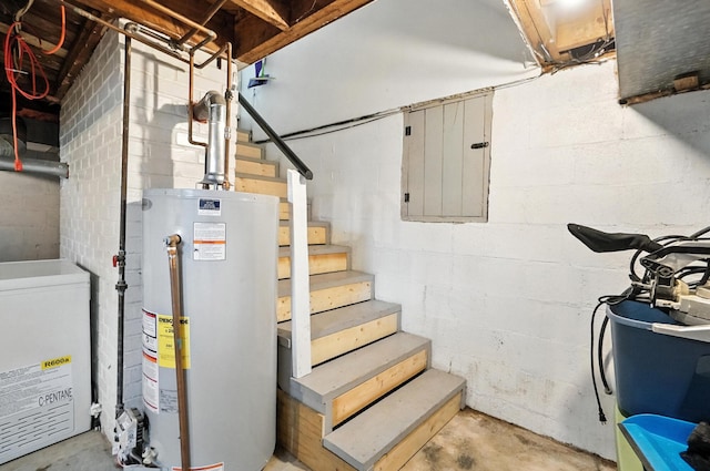 3314 Elizabeth St, Erlanger, KY 41018 - unfinished basement featuring gas water heater and stairway