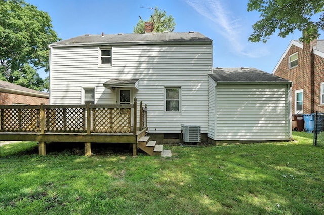 3314 Elizabeth St, Erlanger, KY 41018 - back of house featuring a deck, a lawn, a chimney, and a shingled roof
