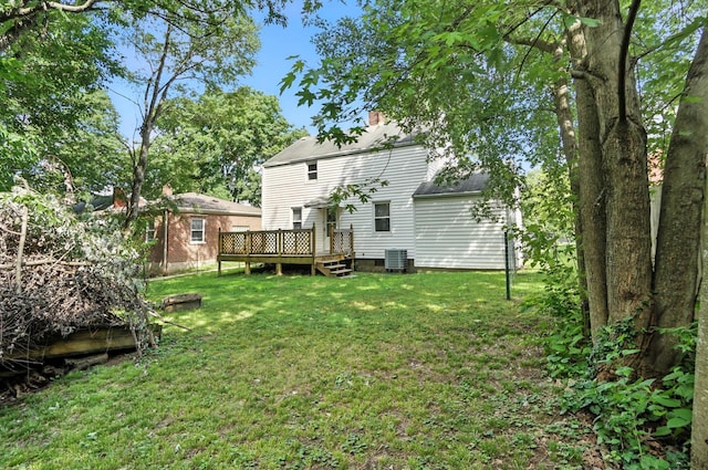 3314 Elizabeth St, Erlanger, KY 41018 - back of house featuring a wooden deck, a lawn, and a chimney
