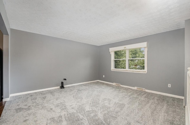 3776 Feather Ln, Elsmere, KY 41018 - spare room with a textured ceiling, baseboards, and carpet floors