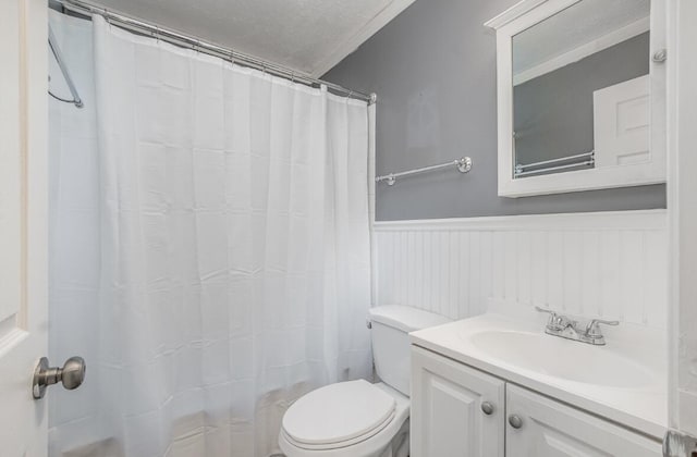 3776 Feather Ln, Elsmere, KY 41018 - bathroom with wainscoting, toilet, vanity, a shower with shower curtain, and a textured ceiling