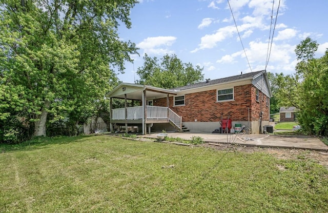 3776 Feather Ln, Elsmere, KY 41018 - rear view of house with brick siding, a patio area, a yard, and a deck