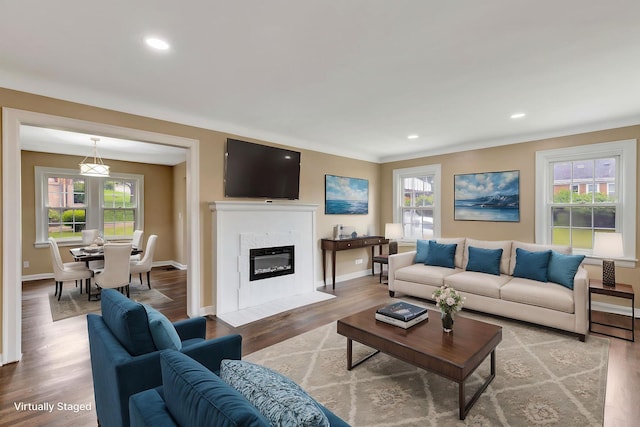 1191 Wilson Rd, Bellevue, KY 41073 - living room with wood finished floors, plenty of natural light, a fireplace, baseboards, and recessed lighting
