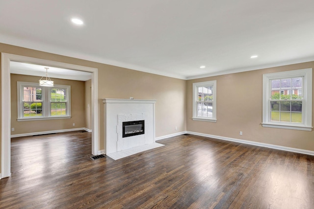1191 Wilson Rd, Bellevue, KY 41073 - unfurnished living room featuring plenty of natural light, dark wood-style flooring, baseboards, and recessed lighting