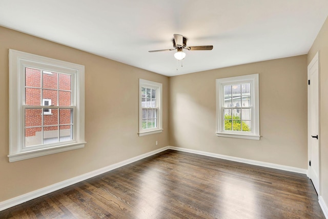 1191 Wilson Rd, Bellevue, KY 41073 - spare room featuring plenty of natural light, a ceiling fan, and baseboards