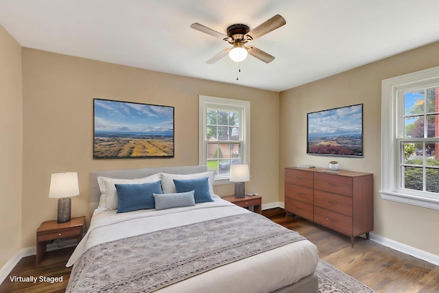 1191 Wilson Rd, Bellevue, KY 41073 - bedroom featuring wood finished floors, baseboards, and ceiling fan