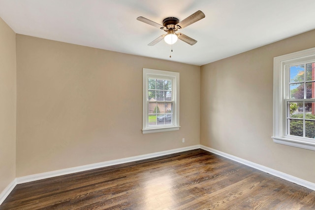 1191 Wilson Rd, Bellevue, KY 41073 - spare room with a ceiling fan, dark wood finished floors, and baseboards