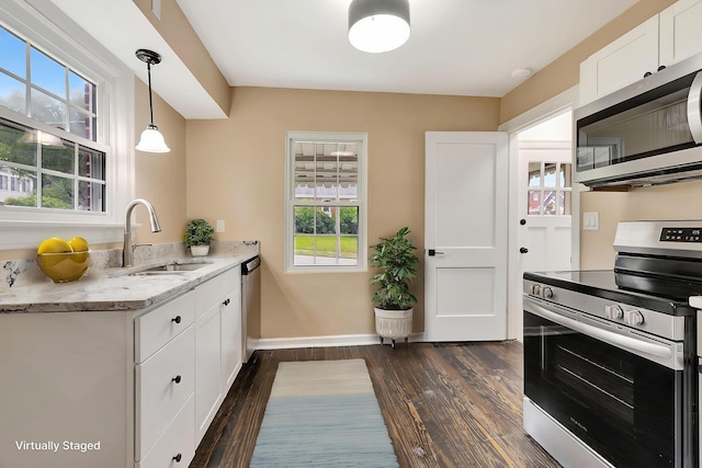 1191 Wilson Rd, Bellevue, KY 41073 - kitchen featuring appliances with stainless steel finishes, a sink, dark wood finished floors, and healthy amount of natural light