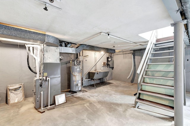 1191 Wilson Rd, Bellevue, KY 41073 - unfinished basement featuring gas water heater, heating unit, stairway, and a sink