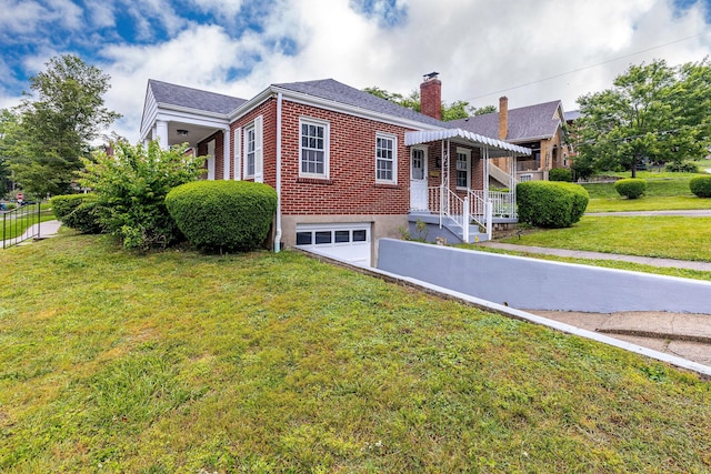 1191 Wilson Rd, Bellevue, KY 41073 - bungalow-style home with a garage, a chimney, brick siding, and a front yard