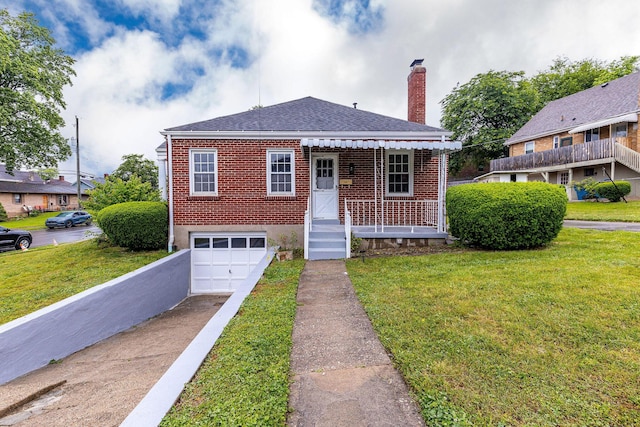 1191 Wilson Rd, Bellevue, KY 41073 - bungalow-style home featuring concrete driveway, brick siding, a chimney, a front lawn, and a garage