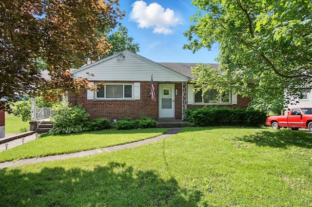 8347 Riley Rd, Alexandria, KY 41001 - bungalow with brick siding and a front yard