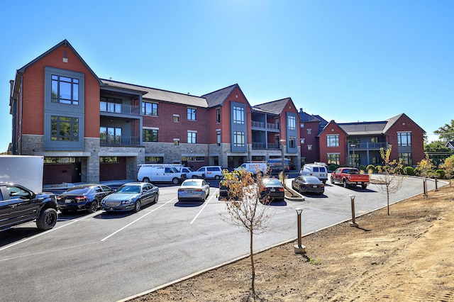 1 Highland Ave Unit 208, Fort Thomas, KY 41075 - view of building exterior with uncovered parking