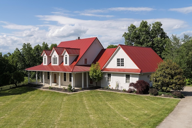 405 Alexander Rd, Crittenden, KY 41030 - view of front facade with a front yard, metal roof, and a porch