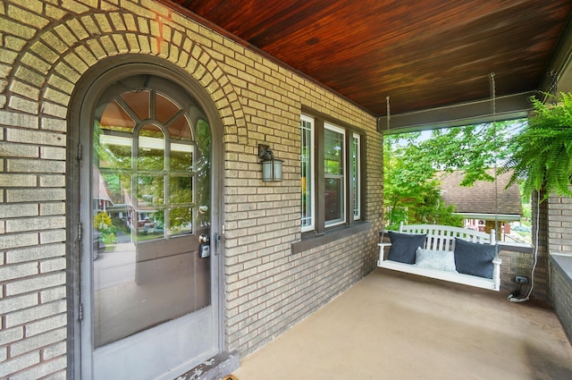 134 Strathmore Ave, Fort Thomas, KY 41075 - property entrance featuring a porch and brick siding