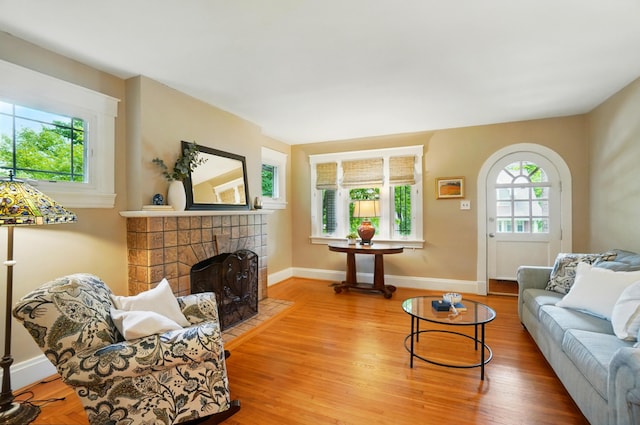 134 Strathmore Ave, Fort Thomas, KY 41075 - living room featuring wood finished floors, baseboards, and a fireplace