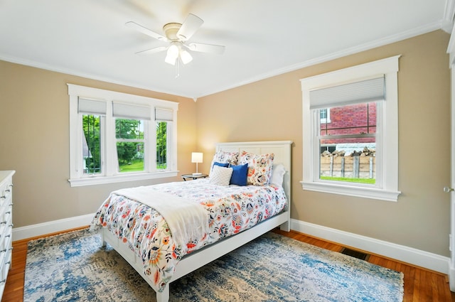 134 Strathmore Ave, Fort Thomas, KY 41075 - bedroom featuring crown molding, baseboards, wood finished floors, and a ceiling fan