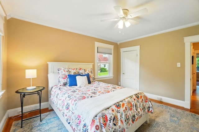 134 Strathmore Ave, Fort Thomas, KY 41075 - bedroom featuring ornamental molding, wood finished floors, baseboards, and a ceiling fan