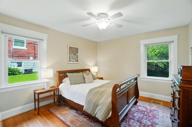 134 Strathmore Ave, Fort Thomas, KY 41075 - bedroom featuring baseboards, wood finished floors, and a ceiling fan