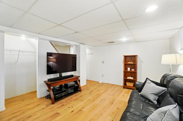134 Strathmore Ave, Fort Thomas, KY 41075 - living area with light wood finished floors, a drop ceiling, and recessed lighting
